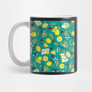 lemons, books and ladybugs on teal Mug